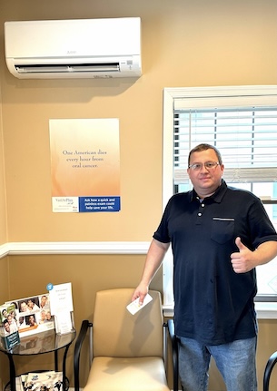 Goldstar Heating & Cooling technician discussing HVAC service with a homeowner in Southampton, PA